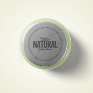 Natural cosmetics container with green lid.