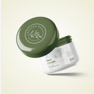 Green-lidded face cream jar, white background.